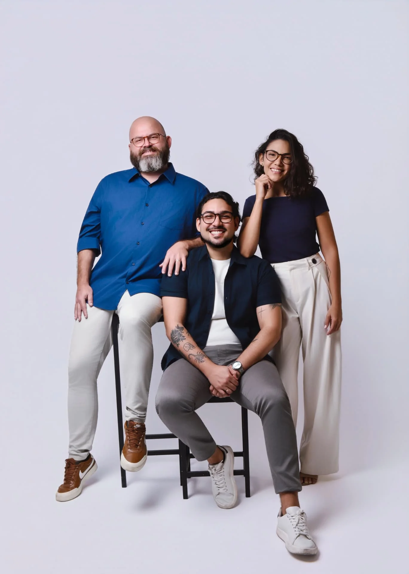 Integrantes do time da Escala Mestre reunidos em fotografia de estúdio